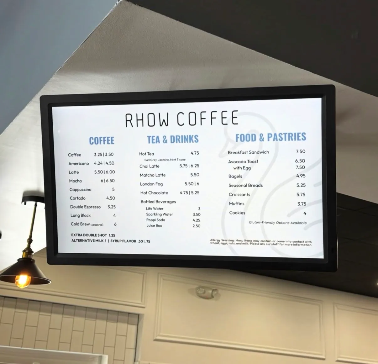RHOW Coffee menu board listing coffee, tea and drinks, and food and pastries